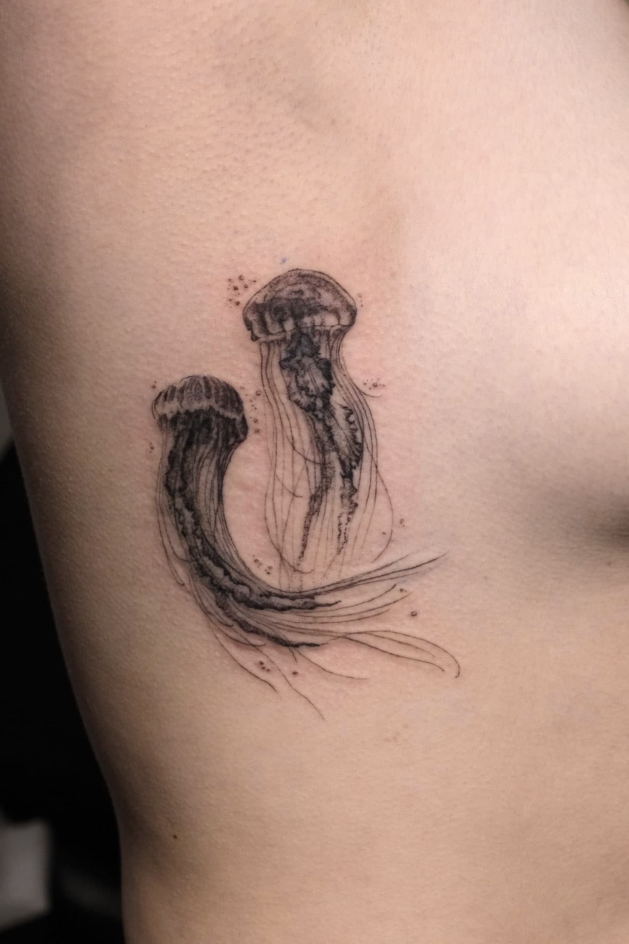 Tattoo by Jak Rapmund - ribs jellyfish