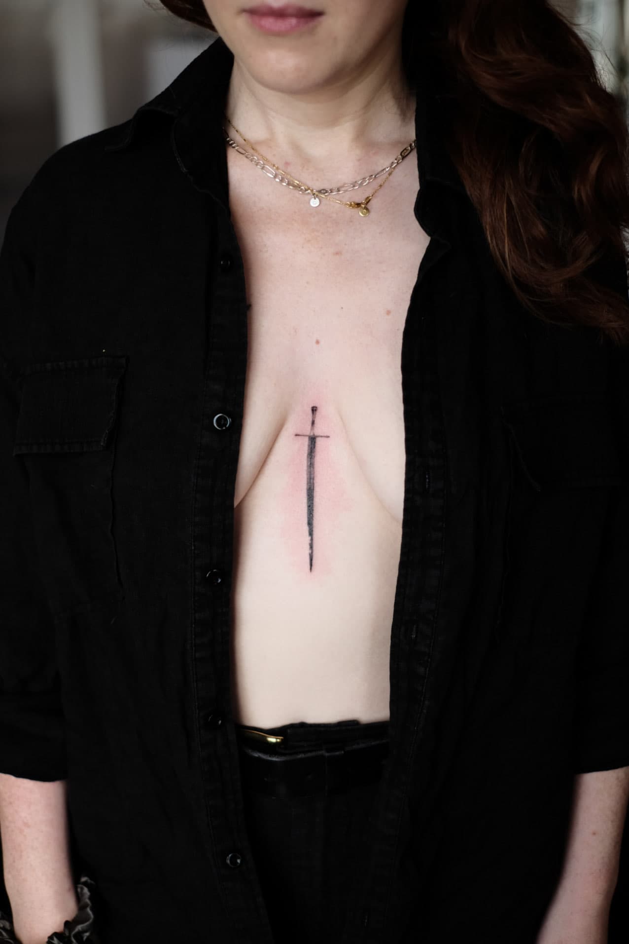 Tattoo by Jak Rapmund - sternum dagger